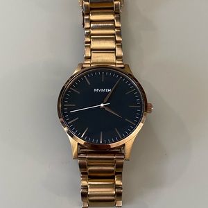 The 40 - MVMT rose gold black men’s watch